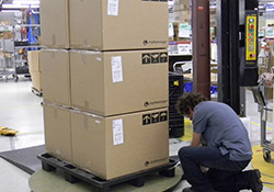 electronics distribution team member working on a shipment