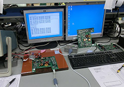 electronics quality control testing a functional board